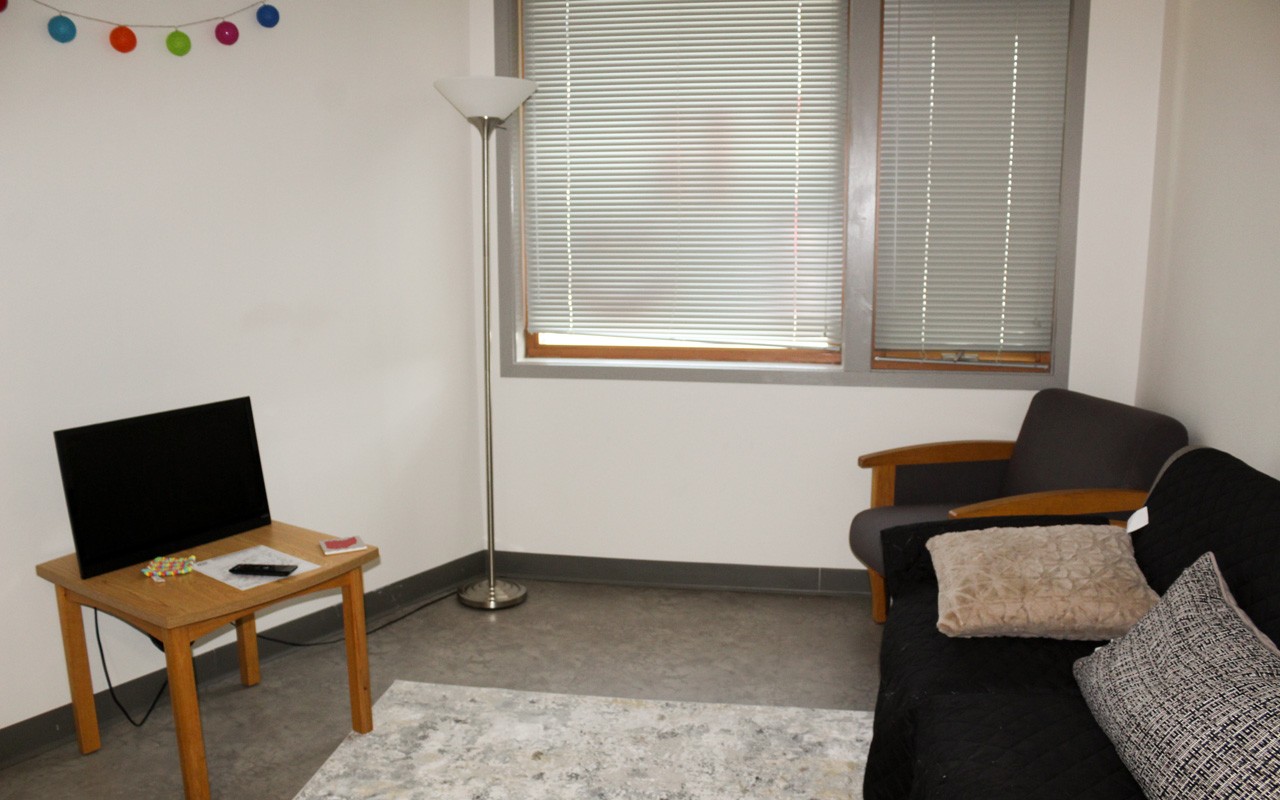 Common area in a quad room in Schneider Hall.