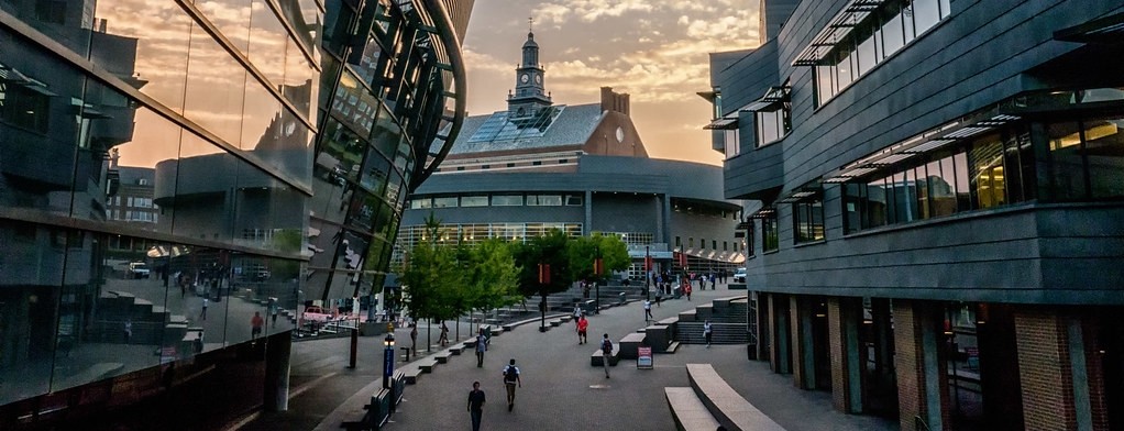 A stock image of a person's hand pushing a button on a phone 